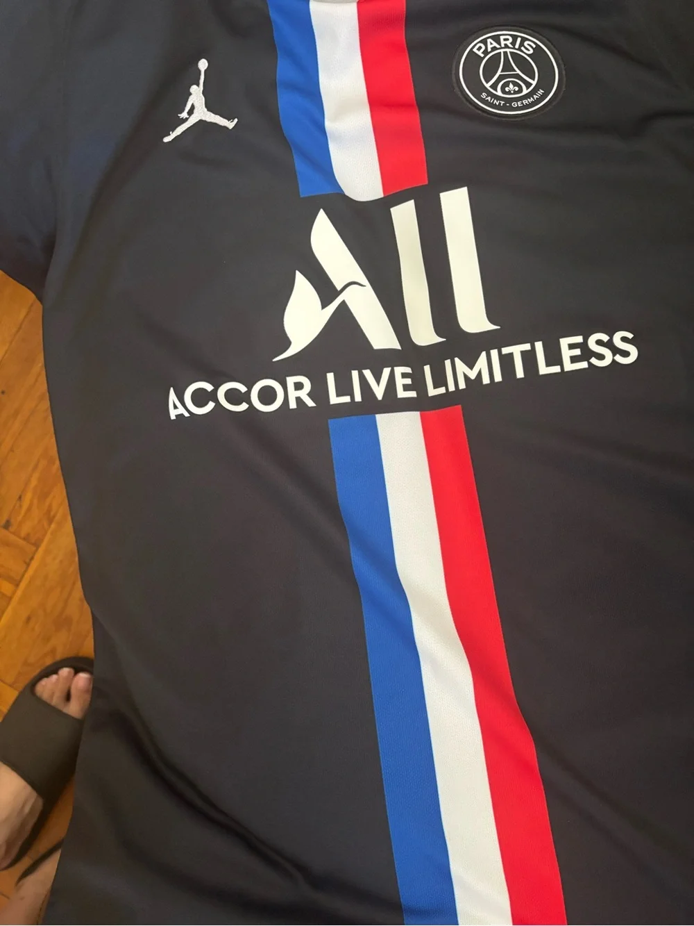 Jordan Men’s Black PSG Football Jersey with Red, White & Blue Stripes